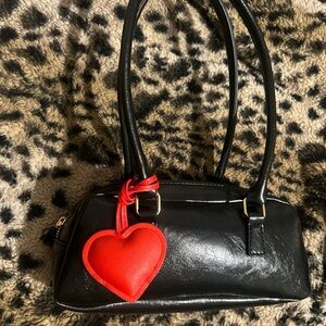 Chic Black Shoulder Bag with Red Heart Charm